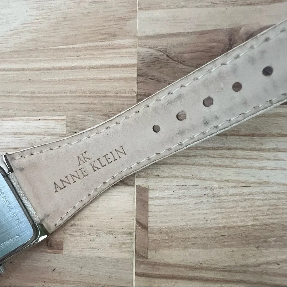 Anne Klein ladies rectangular silver tone dress watch NEW BATTERY
